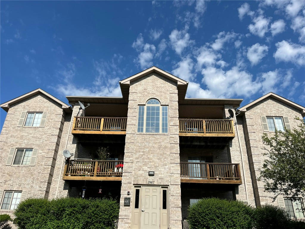 2867 CORAL CT APT 202, CORALVILLE, IA 52241, photo 1 of 4